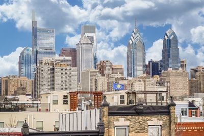 Modern buildings against sky in city