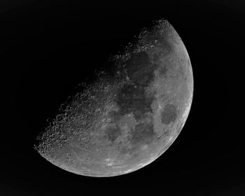 Low angle view of moon against clear sky at night