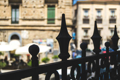 Close-up of railing against building