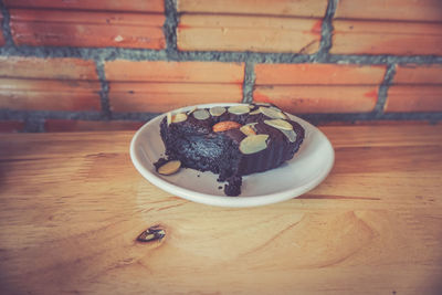 Close-up of cake served on table