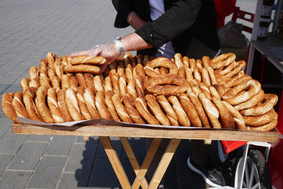 Cropped hand of person holding food