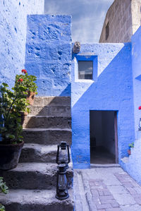 Santa catalina abbey in arequipa, peru with red and blue walls postcard.