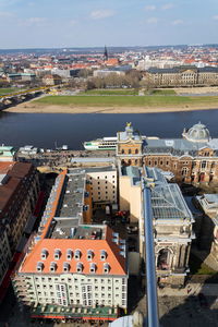 High angle view of river amidst buildings in city