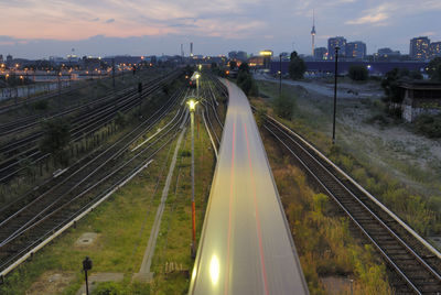 High angle view of train moving at night