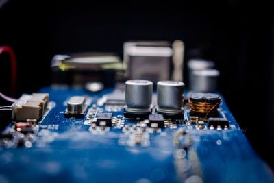 Close-up of circuit board against black background