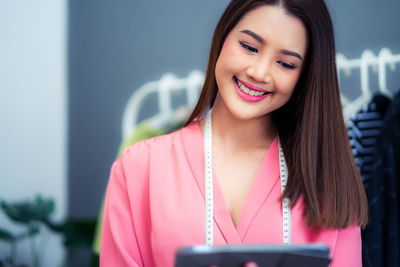 Young woman using mobile phone