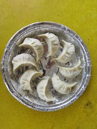 High angle view of fruit in plate on table