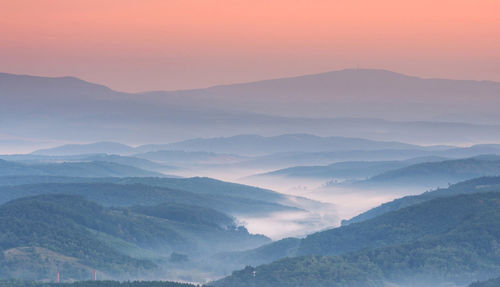 Scenic view of mountains against sky during sunset