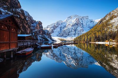 Scenic view of lake and mountains against sky