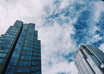 Low angle view of skyscrapers against sky