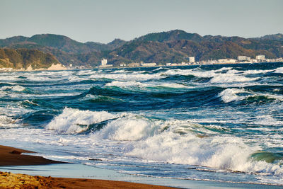 Scenic view of sea against clear sky