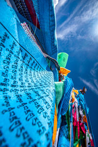 Low angle of lots of prayer flags