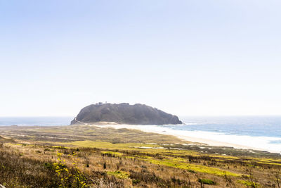 Scenic view of sea against clear sky