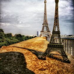 View of tower against cloudy sky