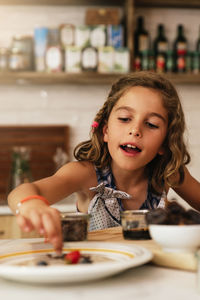 Portrait of smiling girl at home