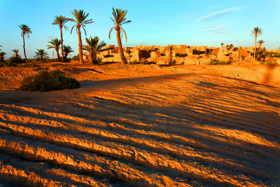 Townscape at erg chebbi desert against sky