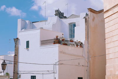 Low angle view of buildings against sky