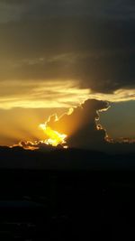 Scenic view of landscape at sunset