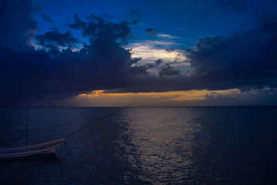 Scenic view of sea against sky at sunset