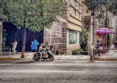 Woman looking at city street