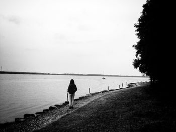 Silhouette of woman in water