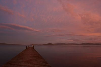 Scenic view of sea against sky at sunset