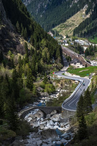 High angle view of road by mountain against sky