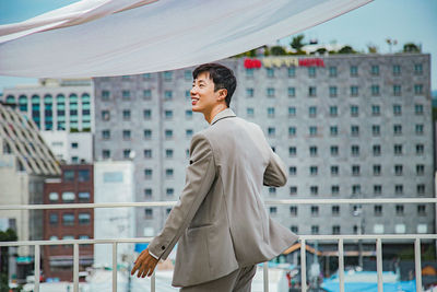 Woman looking at city