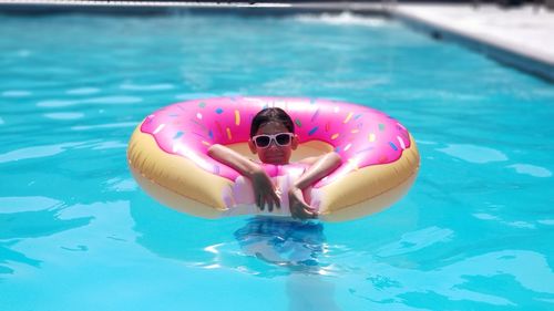 Woman swimming in pool