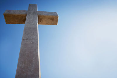 Low angle view of built structure against blue sky