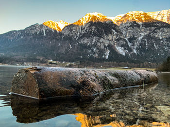Scenic view of lake against mountain range