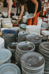 High angle view of plates for sale at market stall