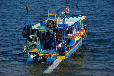 High angle view of ship sailing on sea