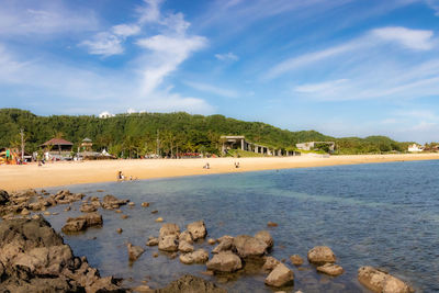 Scenic view of beach against sky