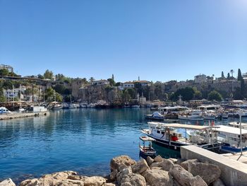Scenic view of sea against clear blue sky
