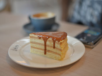 Close-up of coffee served on table