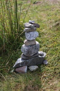 Stack of stones on field