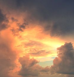 Low angle view of dramatic sky during sunset