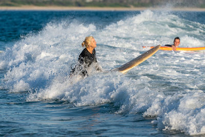 People enjoying in sea