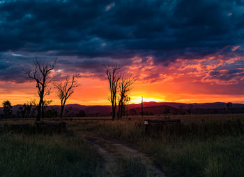 Scenic view of dramatic sky during sunset