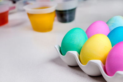 Close-up of multi colored balloons on table