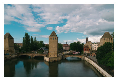 Bridge over river against sky