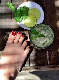 High angle view of woman legs in bowl