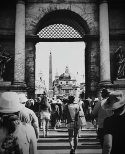 Tourists in front of building