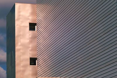 Low angle view of modern building against sky