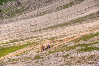 People walking on landscape