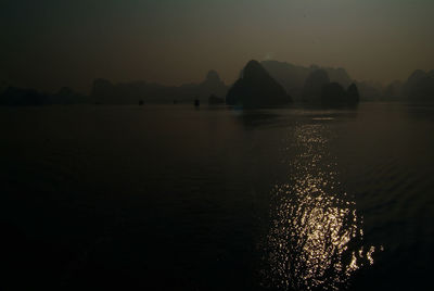 Scenic view of sea against sky at sunset