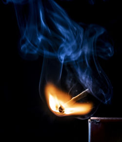 Close-up of smoke against black background