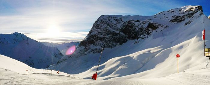 Scenic view of snow covered mountains