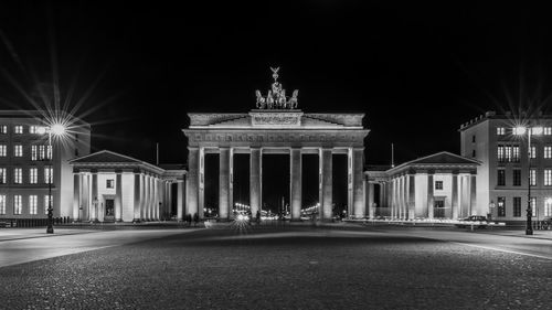 View of city lit up at night